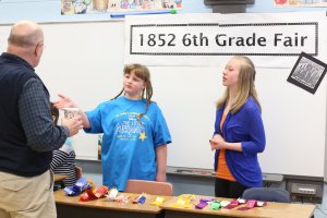Sixth graders welcome grandparents to a celebration of Midwestern history
